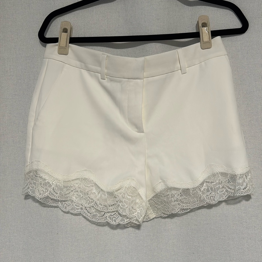 White shorts with lace trim